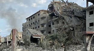 Bombede bygninger i Gaza. Foto: SOS-barnebyer
